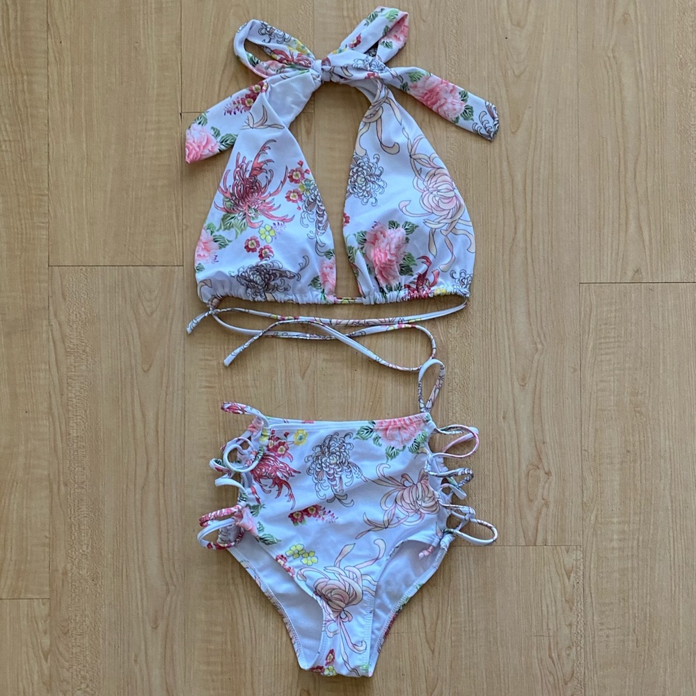 NWOT white and floral bikini with cool laced sides